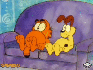 GIF: Garfield and his friend struggle to get off the couch