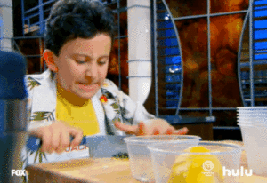 GIF: a boy chops up herbs very quickly