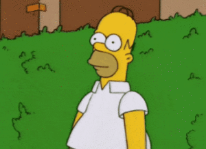 GIF: Homer Simpson walks backwards and disappears into a hedge