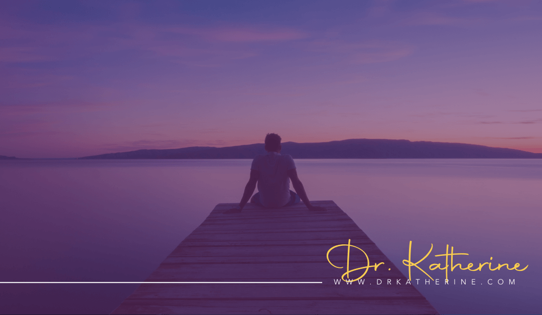 TO THINK OR TO FEEL: WHICH IS MORE IMPORTANT? (AND WHY SHOULD WE CARE?) - Purple image of man sitting on a dock looking out to a river and hills